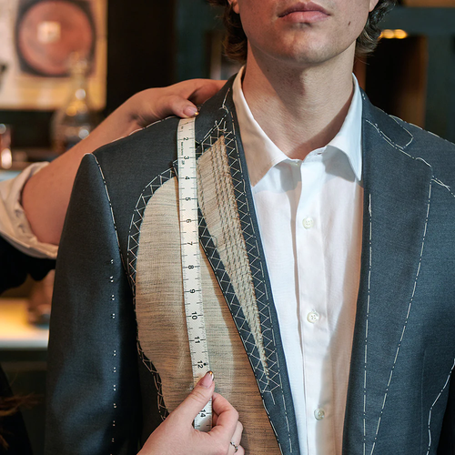 model gets measured for custom
