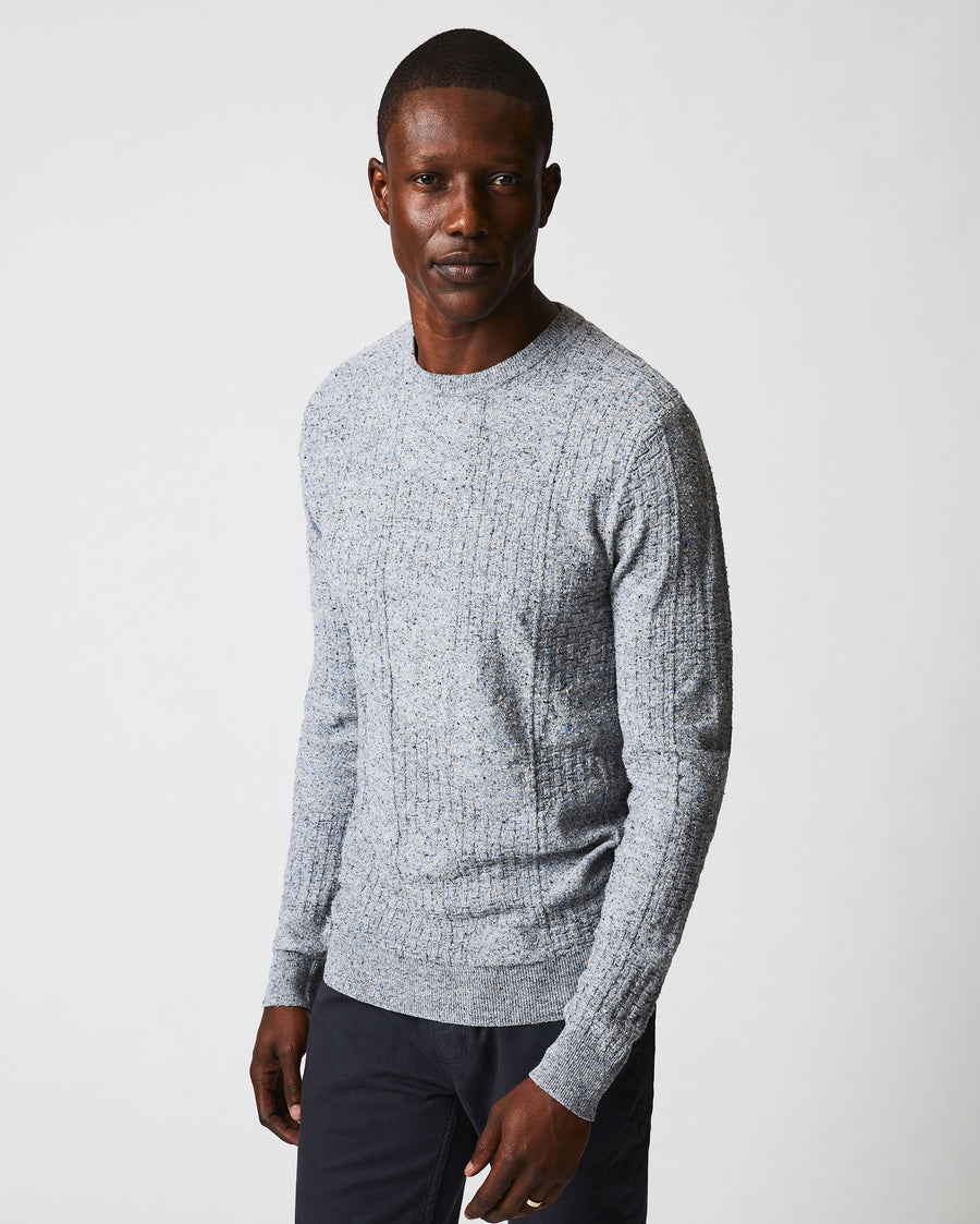 Male model wears the Weave Sweater Crew in Light Grey Marled