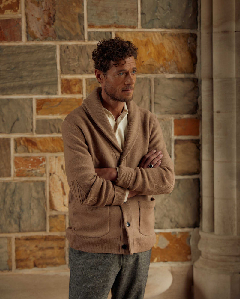 Male model wears the Collegiate Cardigan