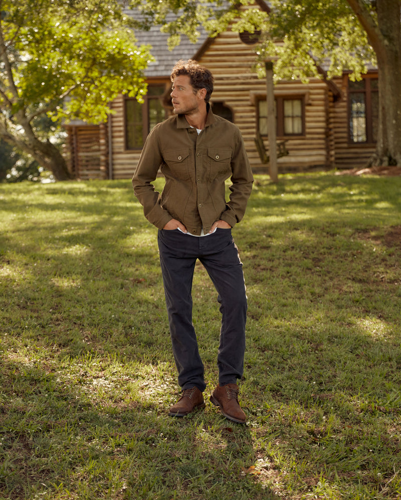 Male model wears the Billy Reid Moleskin Tupelo Trucker Jacket in Olive
