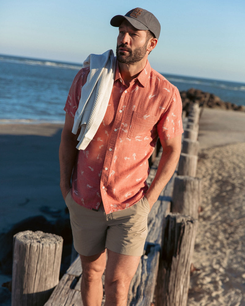 Tuscumbia Shirt in Clay worn by male model at the beach