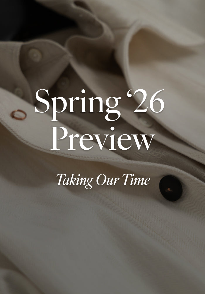 Text reading Spring '26 Preview: Taking Our Time overlaid a close-up image of a chore coat.