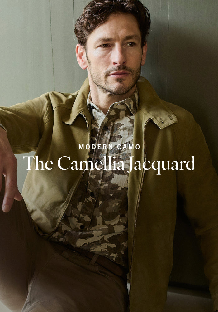 Man wearing a green jacket with 'Modern Camo' text overlay