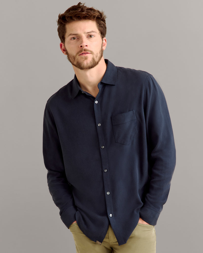 Model wears the SILK JOHN T SHIRT.