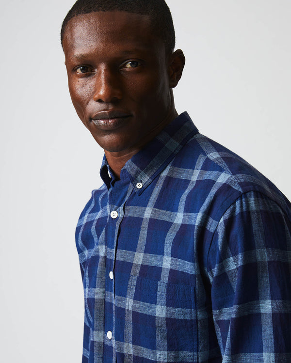 Male model wears the Tuscumbia Shirt Button Down in Indigo