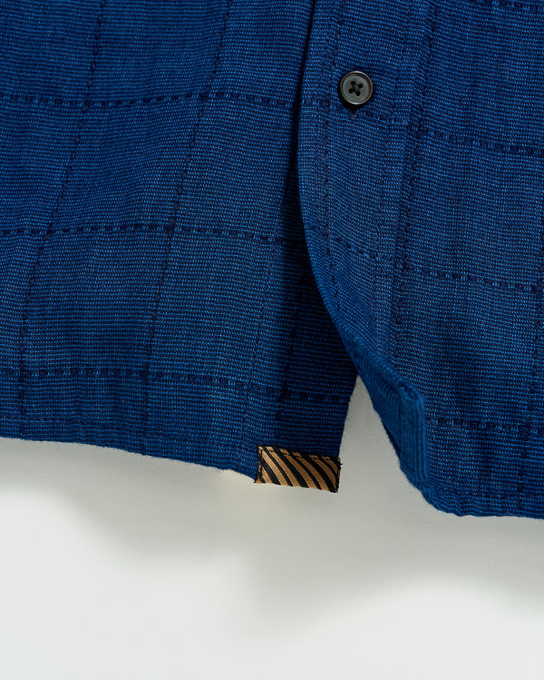 Western Shirt in Indigo | Heirloom tab at bottom hem.