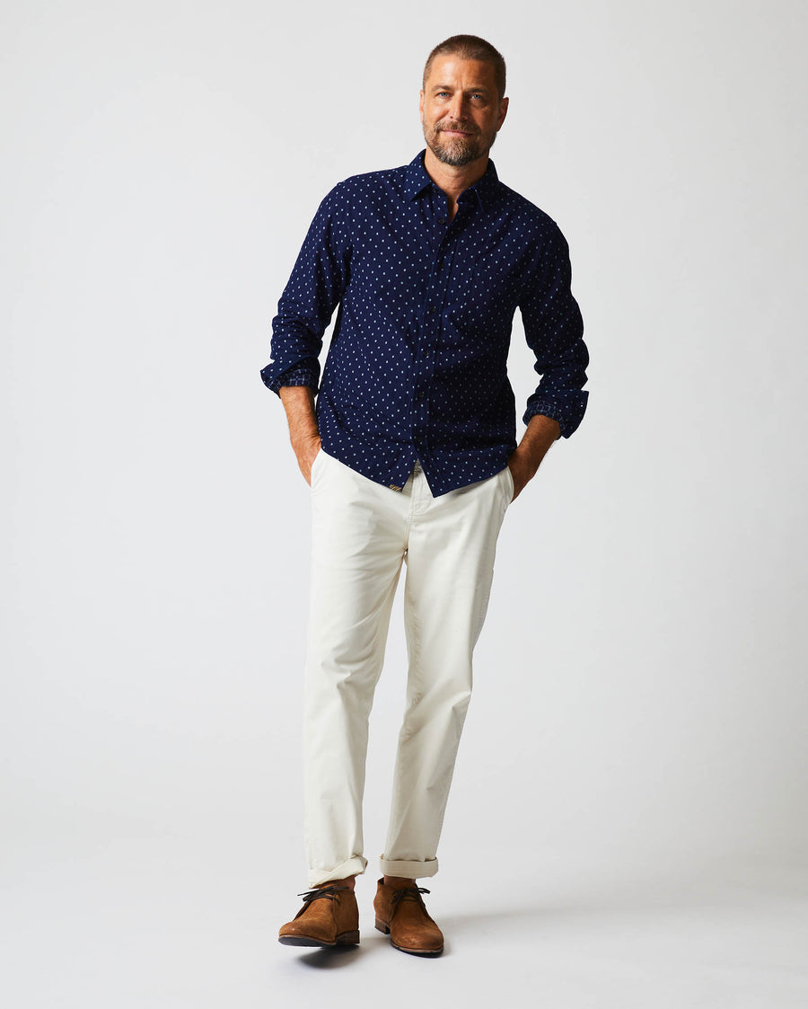 Male model wears the Tuscumbia Shirt in Indigo/White