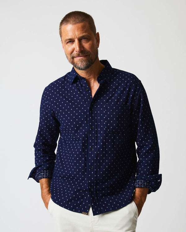 Male model wears the Tuscumbia Shirt in Indigo/White