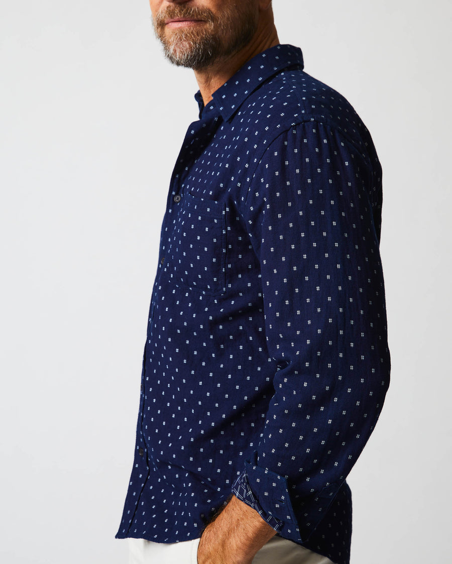Male model wears the Tuscumbia Shirt in Indigo/White