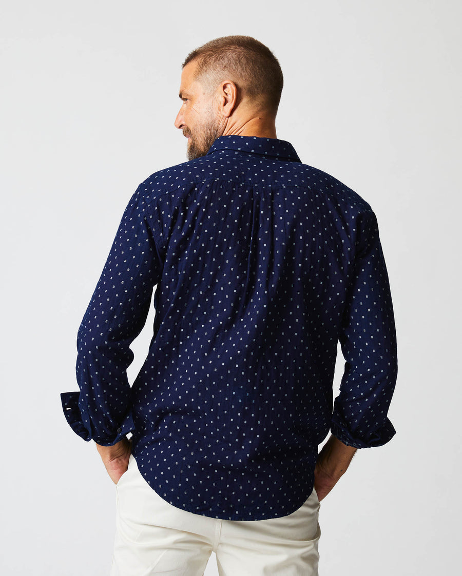 Male model wears the Tuscumbia Shirt in Indigo/White