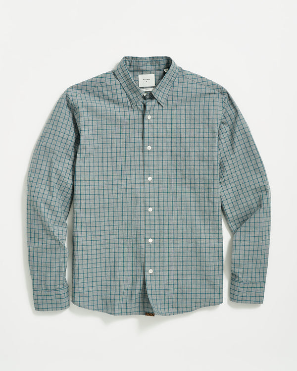 Male model wears the Melange Windowpane Tuscumbia Shirt Hidden Button Down in Grey/Teal