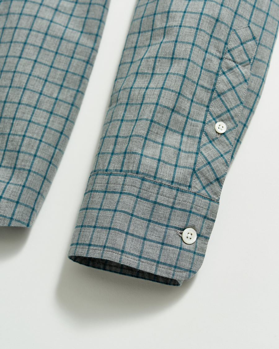 Male model wears the Melange Windowpane Tuscumbia Shirt Hidden Button Down in Grey/Teal