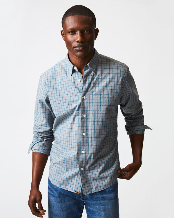 Male model wears the Melange Windowpane Tuscumbia Shirt Hidden Button Down in Grey/Teal