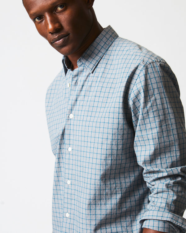 Male model wears the Melange Windowpane Tuscumbia Shirt Hidden Button Down in Grey/Teal