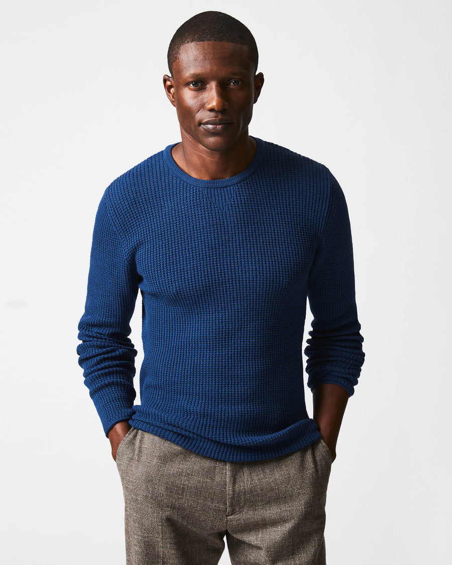 Male model wears the Mini Waffle Crew in Denim Blue