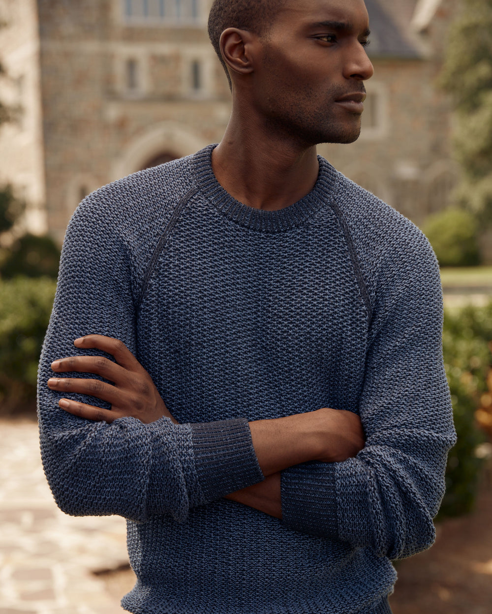 Male model wears a Billy Reid sweater