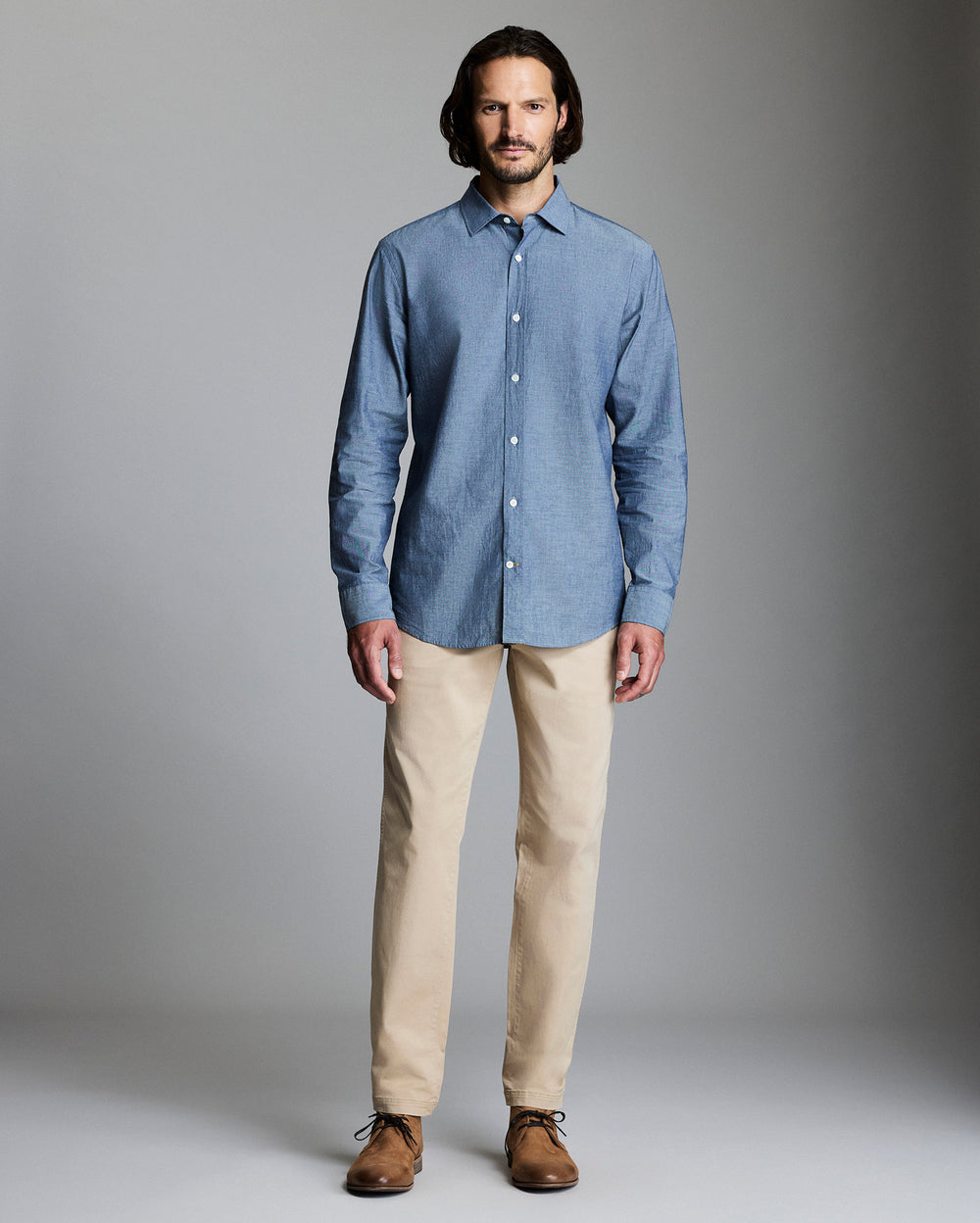 Model wears the Chambray Holt Dress Shirt