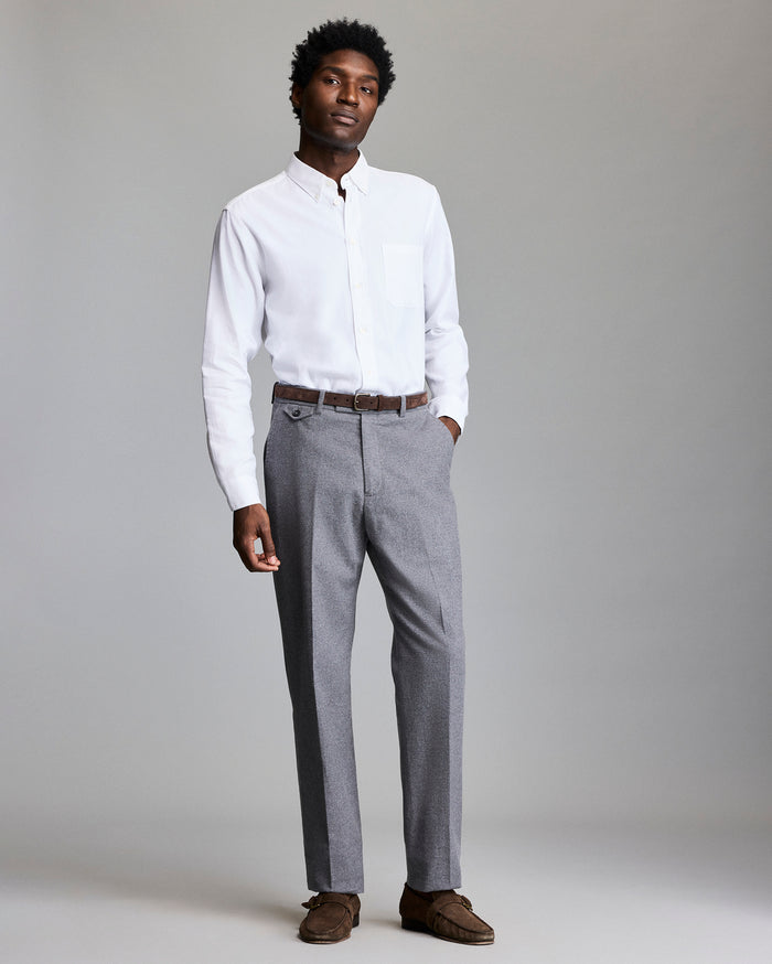 Male model wears the white button down shirt.