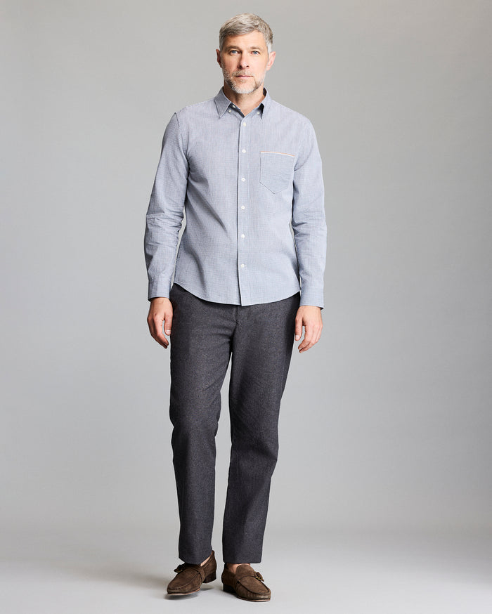 Model wears the button up shirt