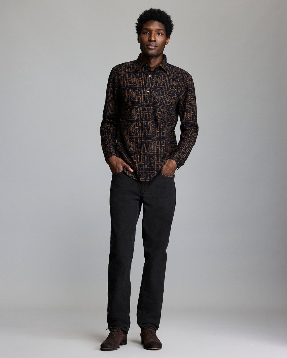 Model shows the fit of the shirt.