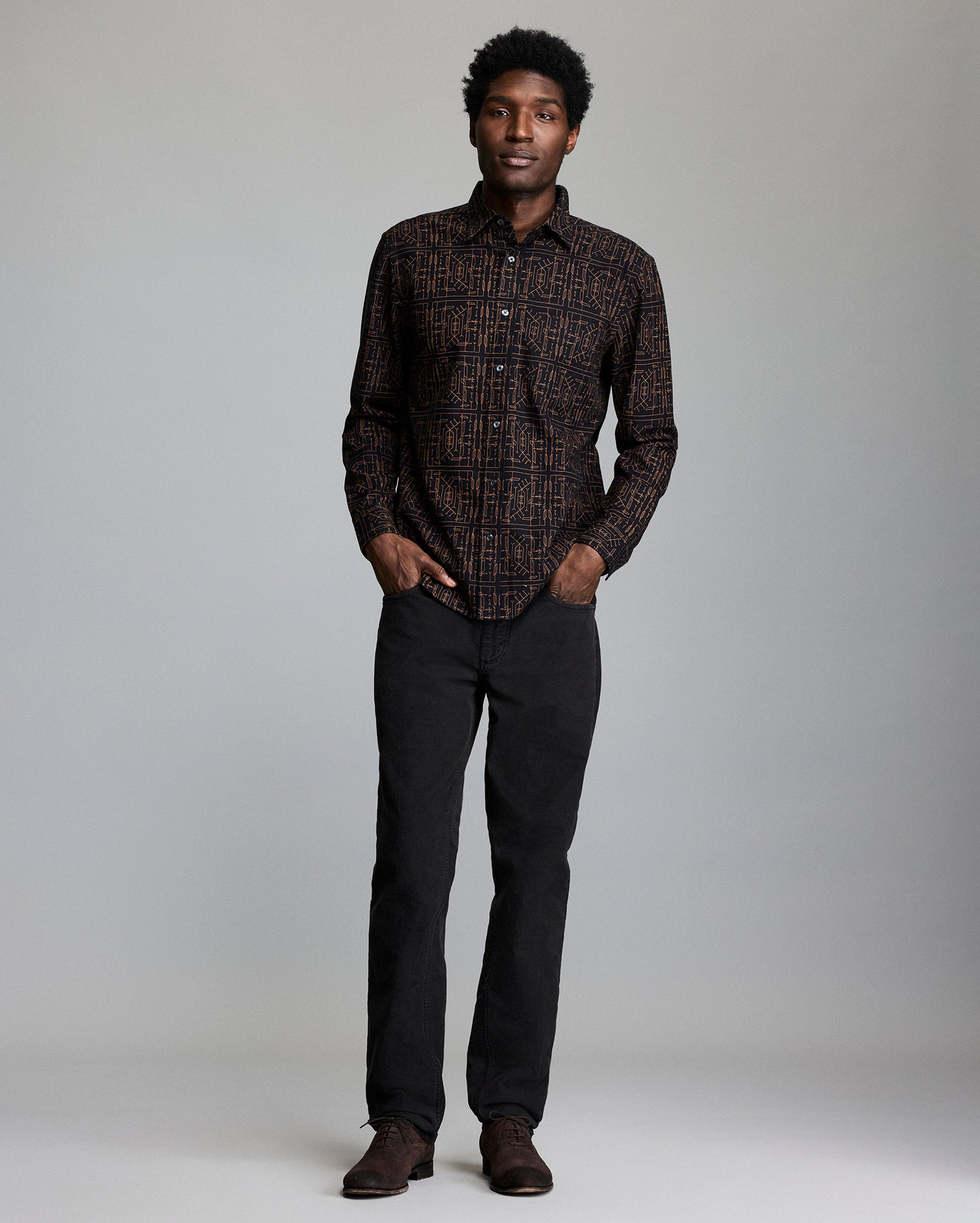 Model shows the fit of the shirt.