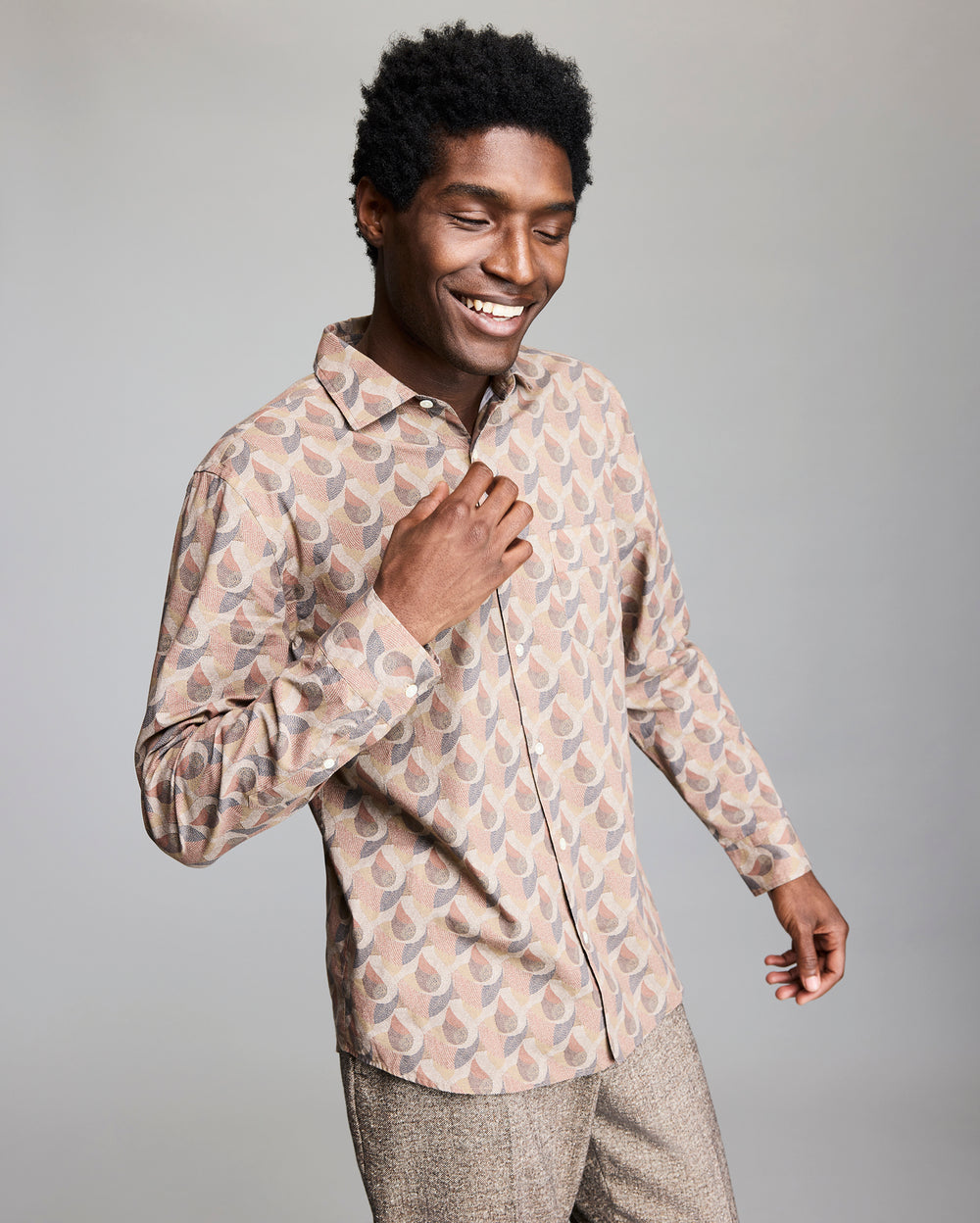Model wears the Flow Pickwick Shirt. 