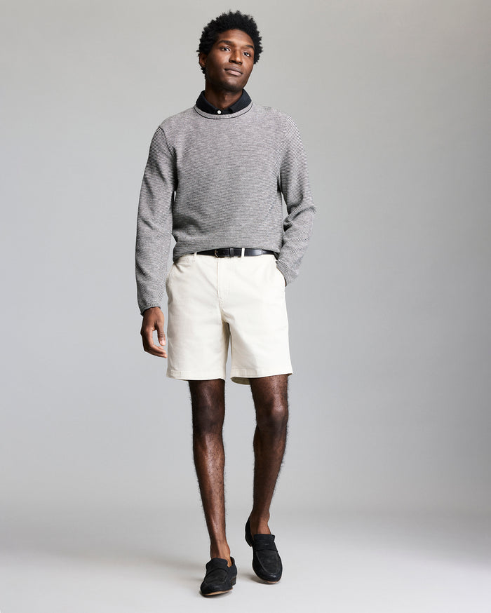 Model wears the Tuck Stripe Crew in Black