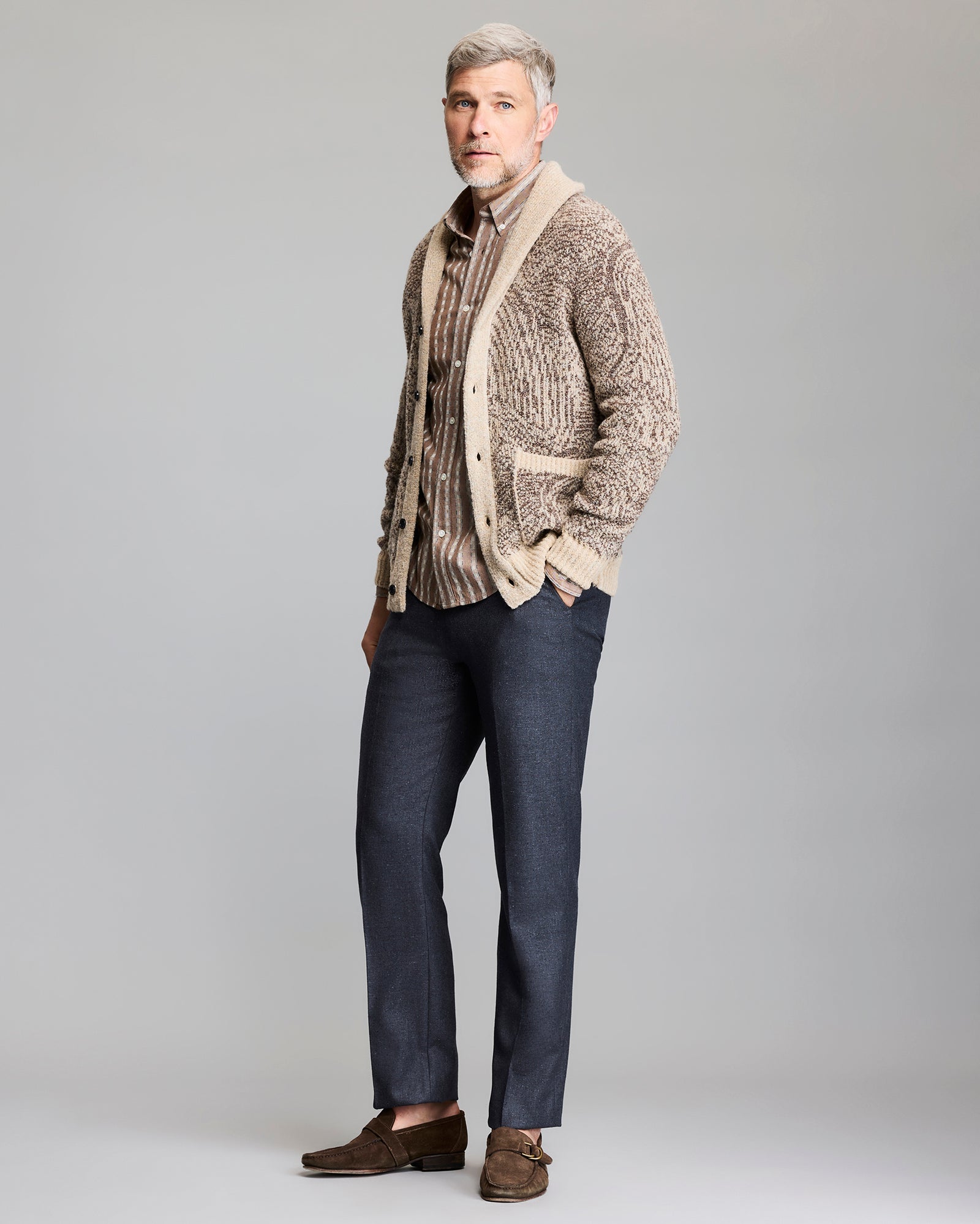 Model shows the fit of the cardigan.