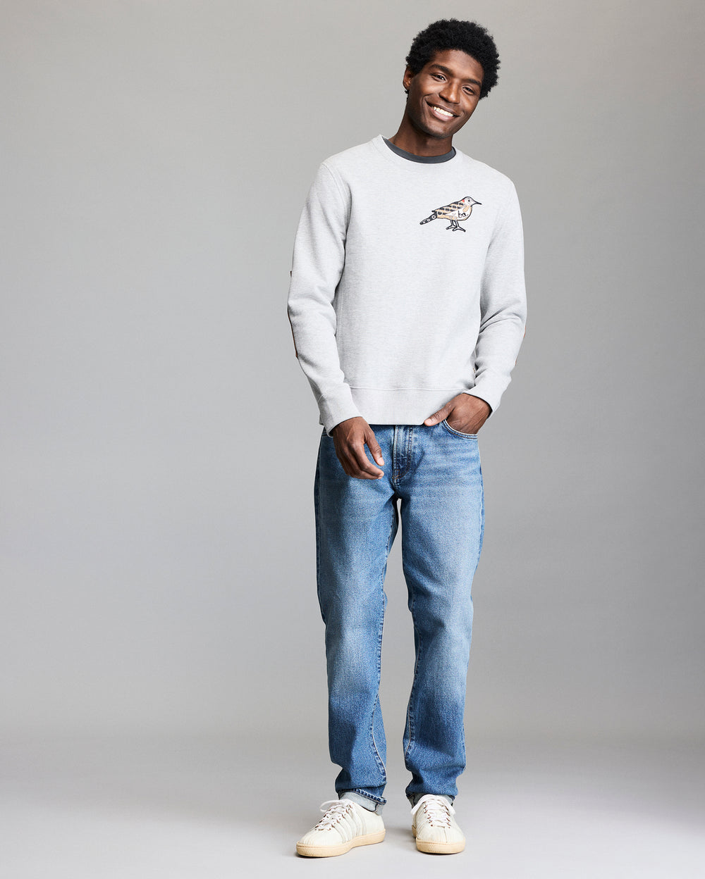 Model shows the fit of the sweatshirt.