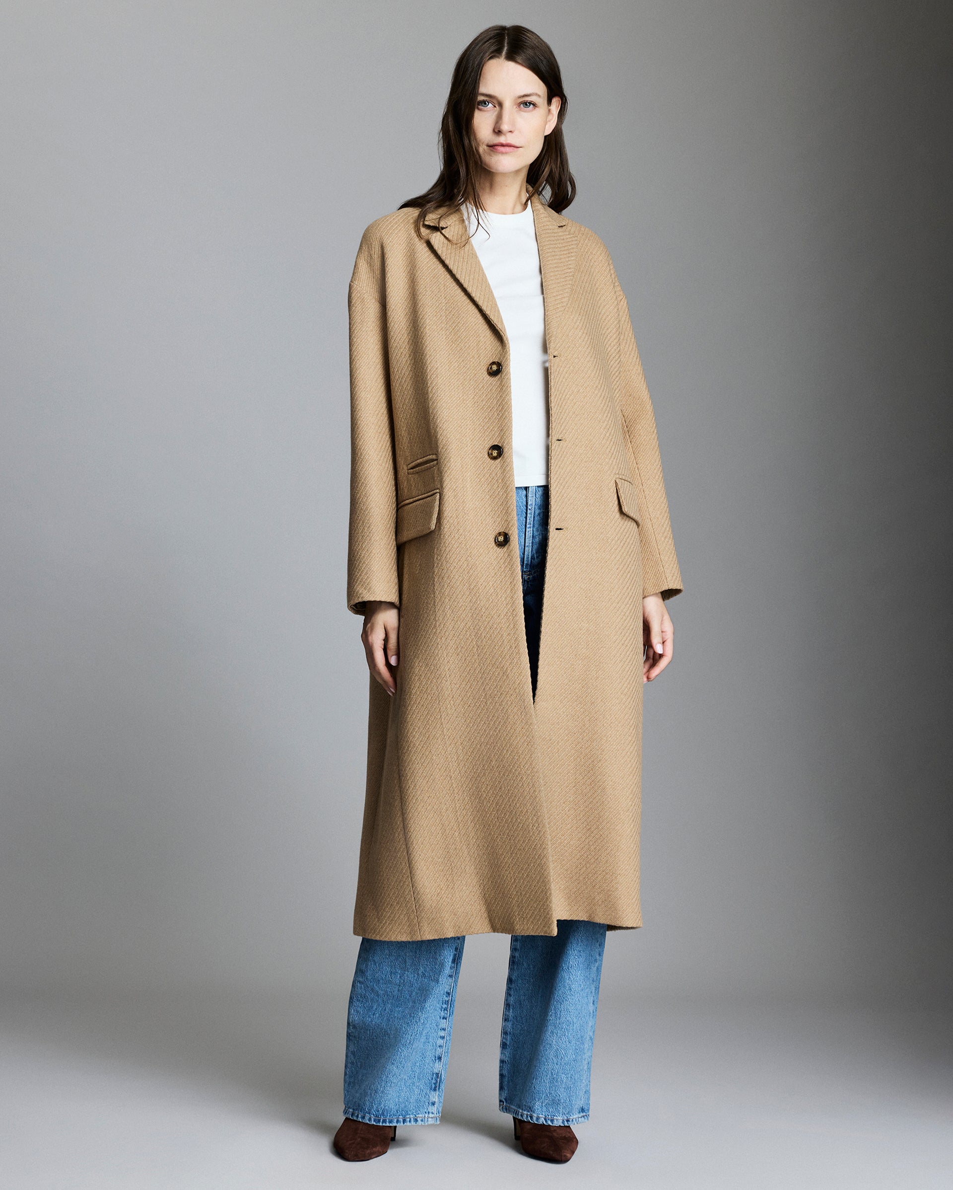 Model wears the coat.