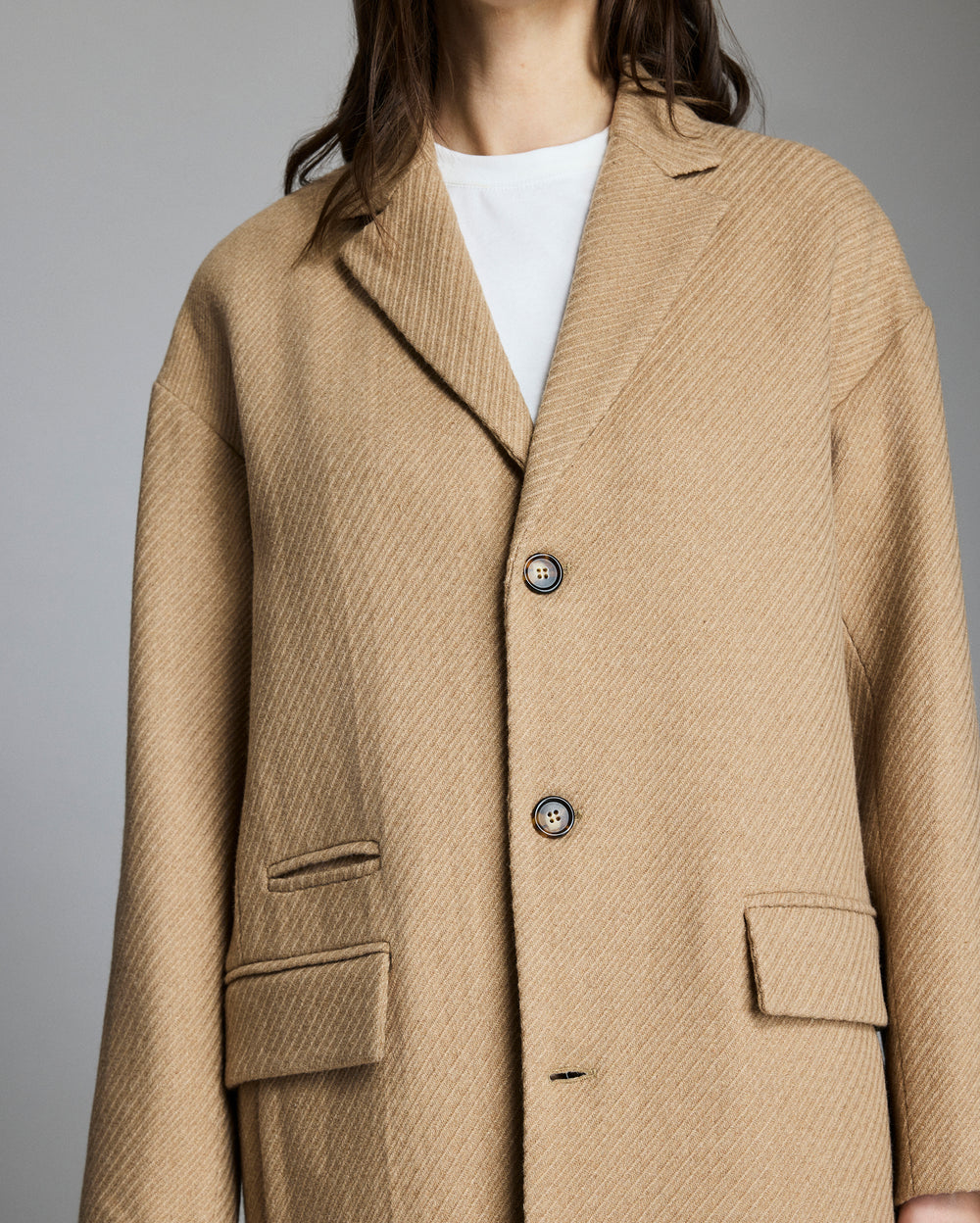 Photo of the coat shows the texture