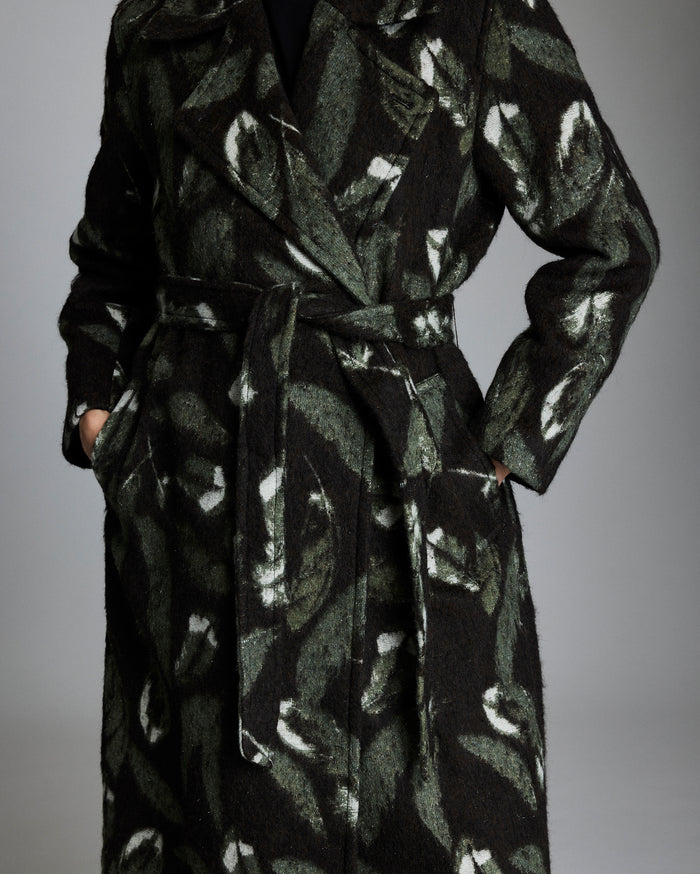 Black patterned coat on a gray background