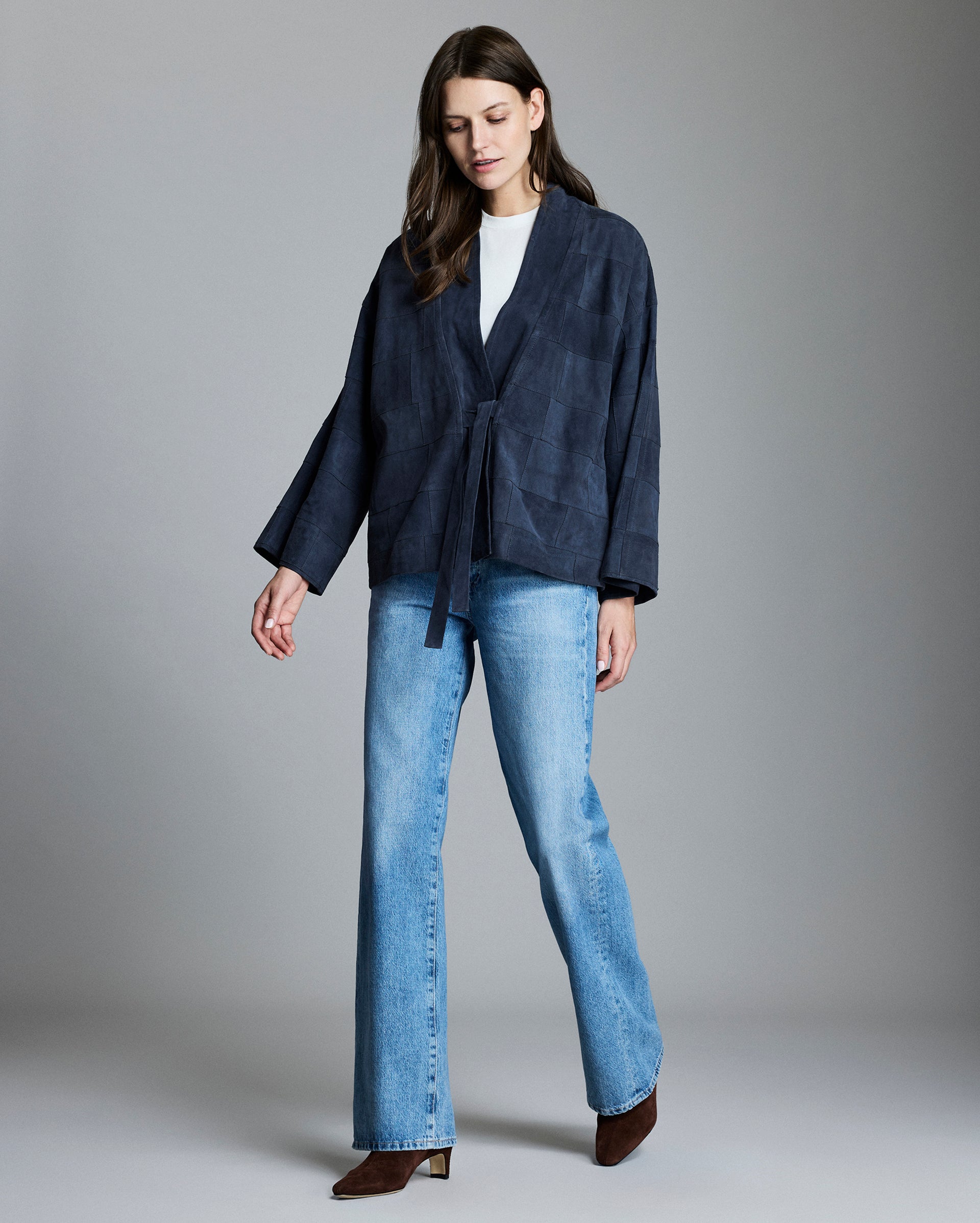 Model wears the Patchwork Garment Dyed Suede Jacket