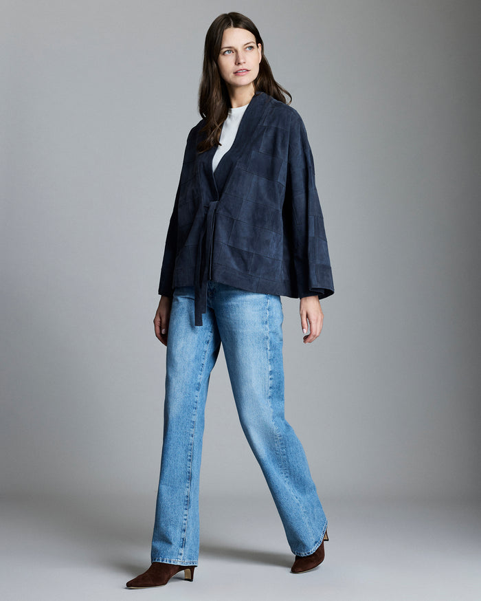 Woman wears the Garment Dyed Suede Jacket