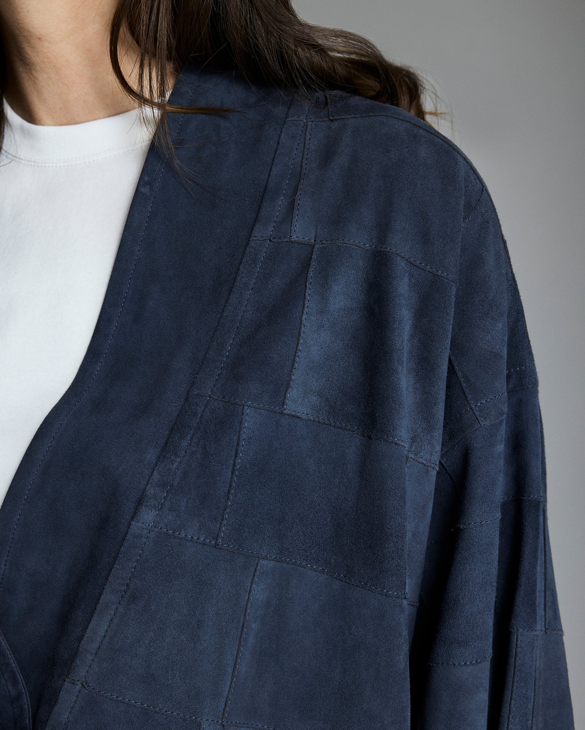 Patchwork detailing on the jacket.