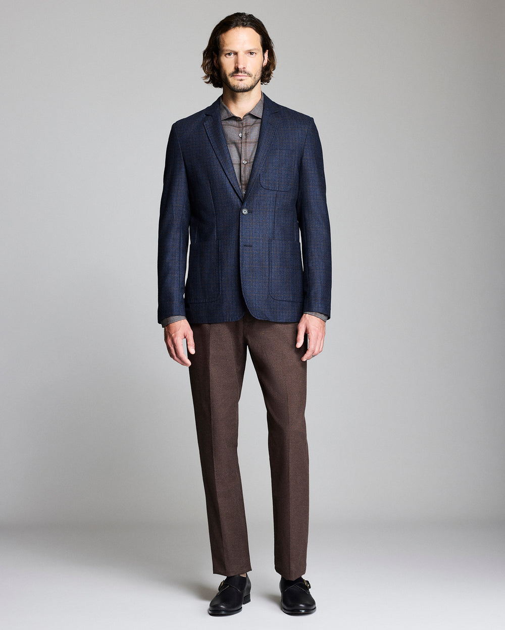 Model shows the fit of the Virgin Wool Plaid Archie Jacket
