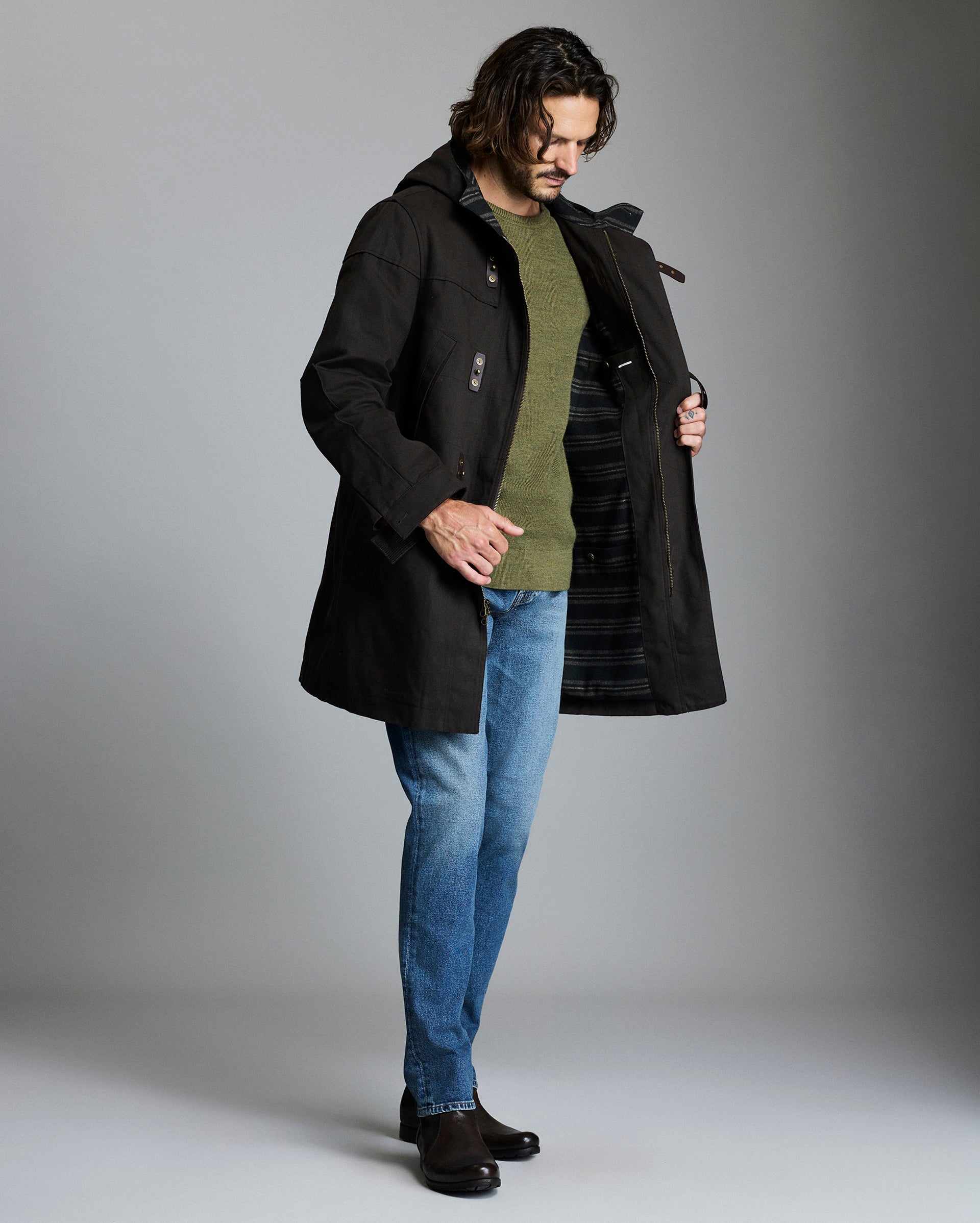 Model shows the inside of the coat