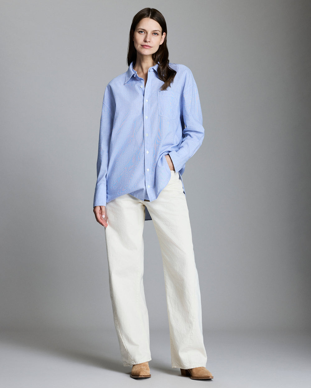 Model wears the DETACHABLE COLLAR DOLMAN SHIRT. 