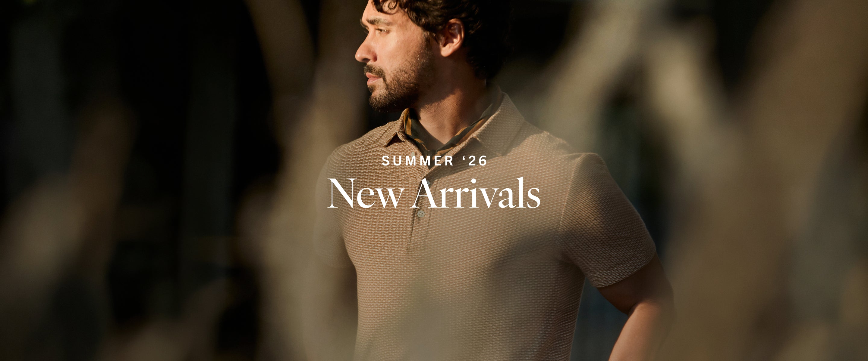 Model wears a Billy Reid polo. Text overlay reads: Summer '26 - New Arrivals