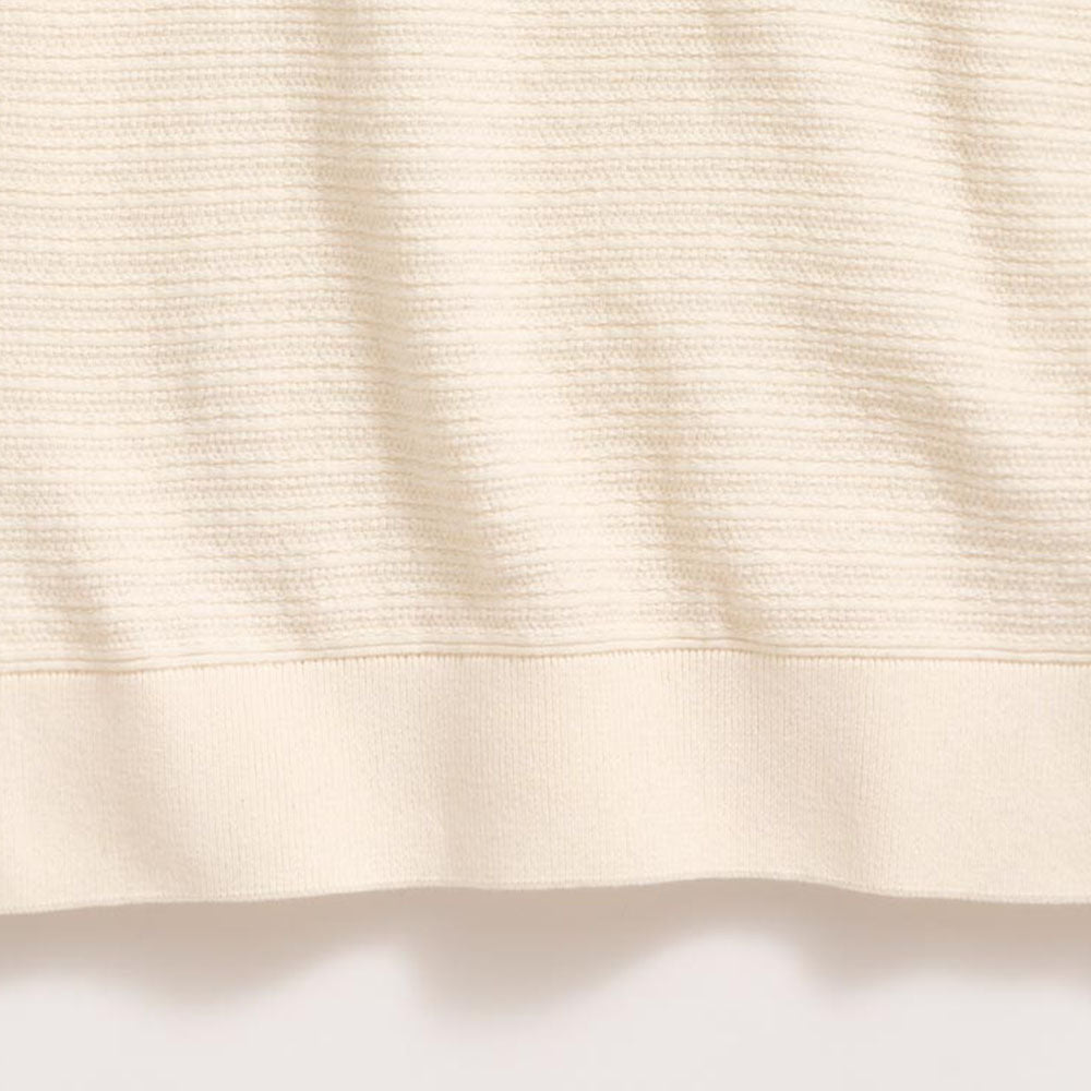 Close-up of beige fabric texture