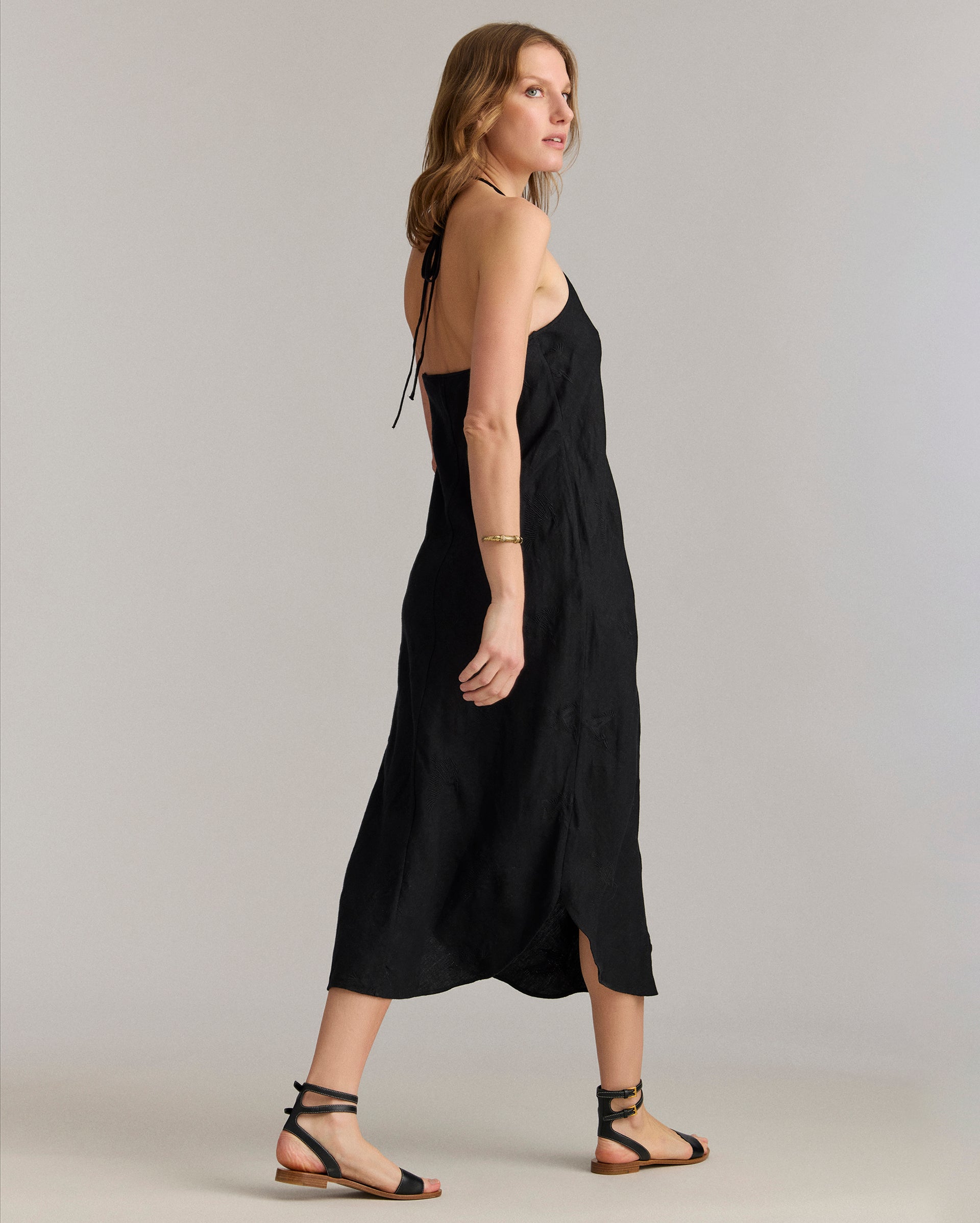 Back view of the dress shows off the low-back cut.