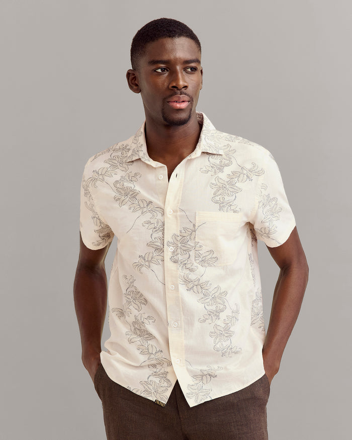 Model wears the Short Sleeve Watercolor Lily Jacquard Treme Shirt in Highway Grey