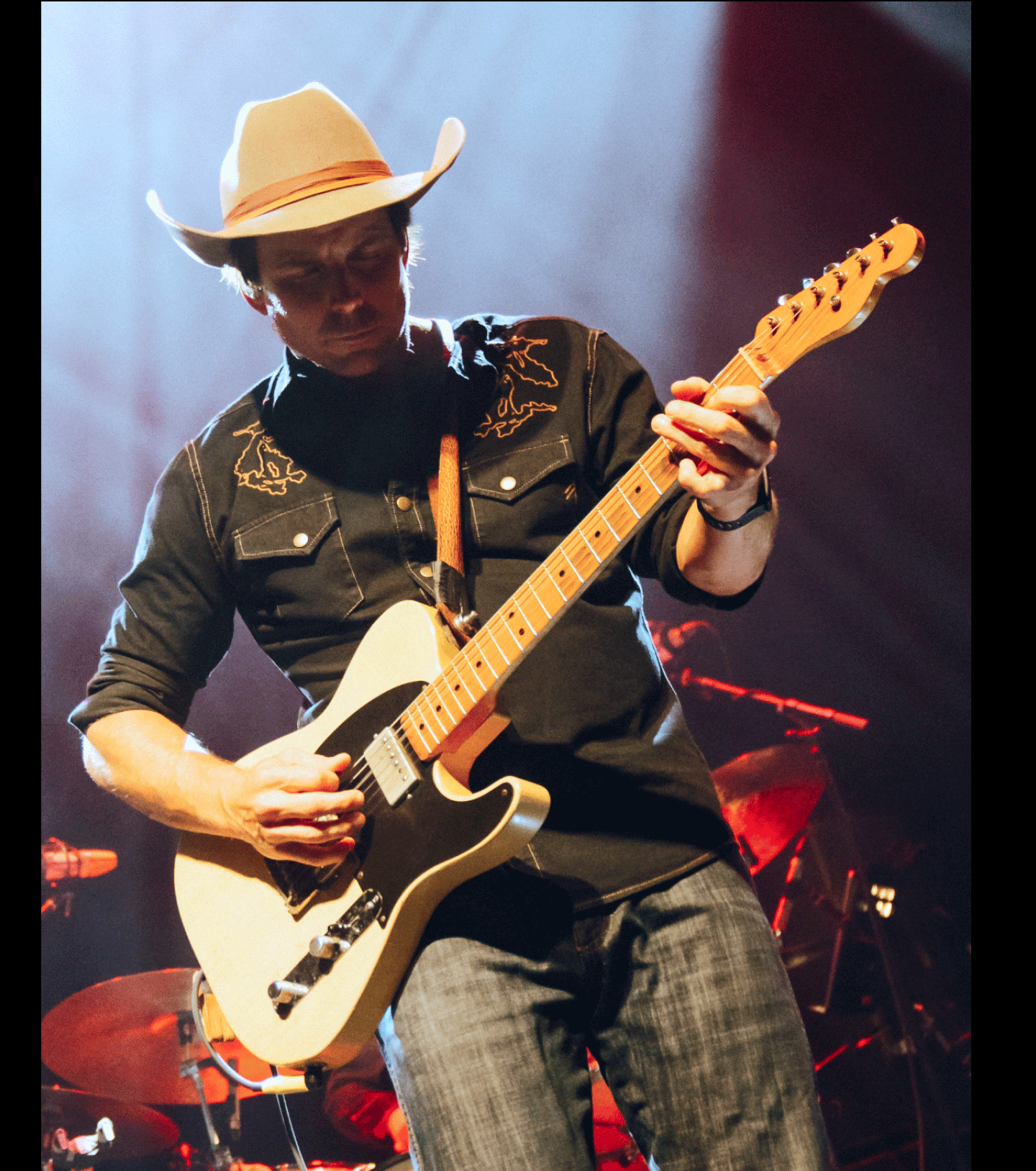 Lukas Nelson plays guitar