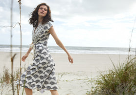 Female model wears a dress from Billy Reid's newest drop: Beach