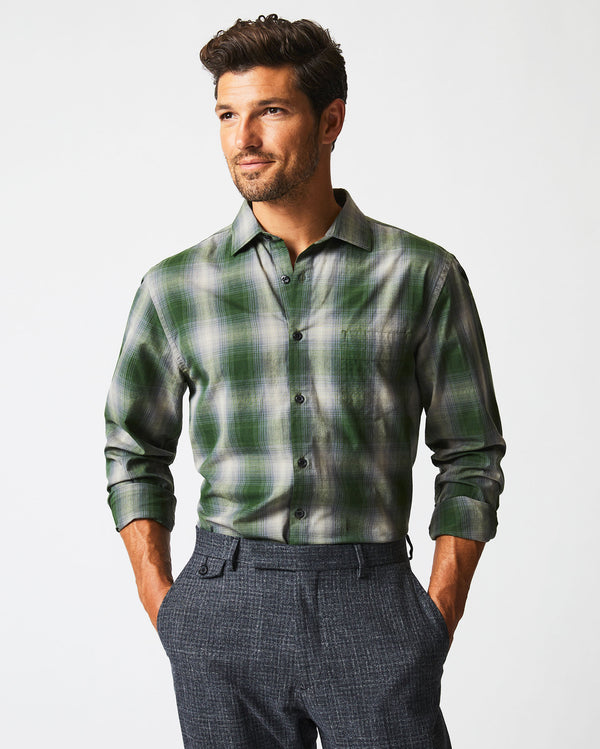 Male model wears the Shadow Plaid Tuscumbia Shirt in Green/Grey