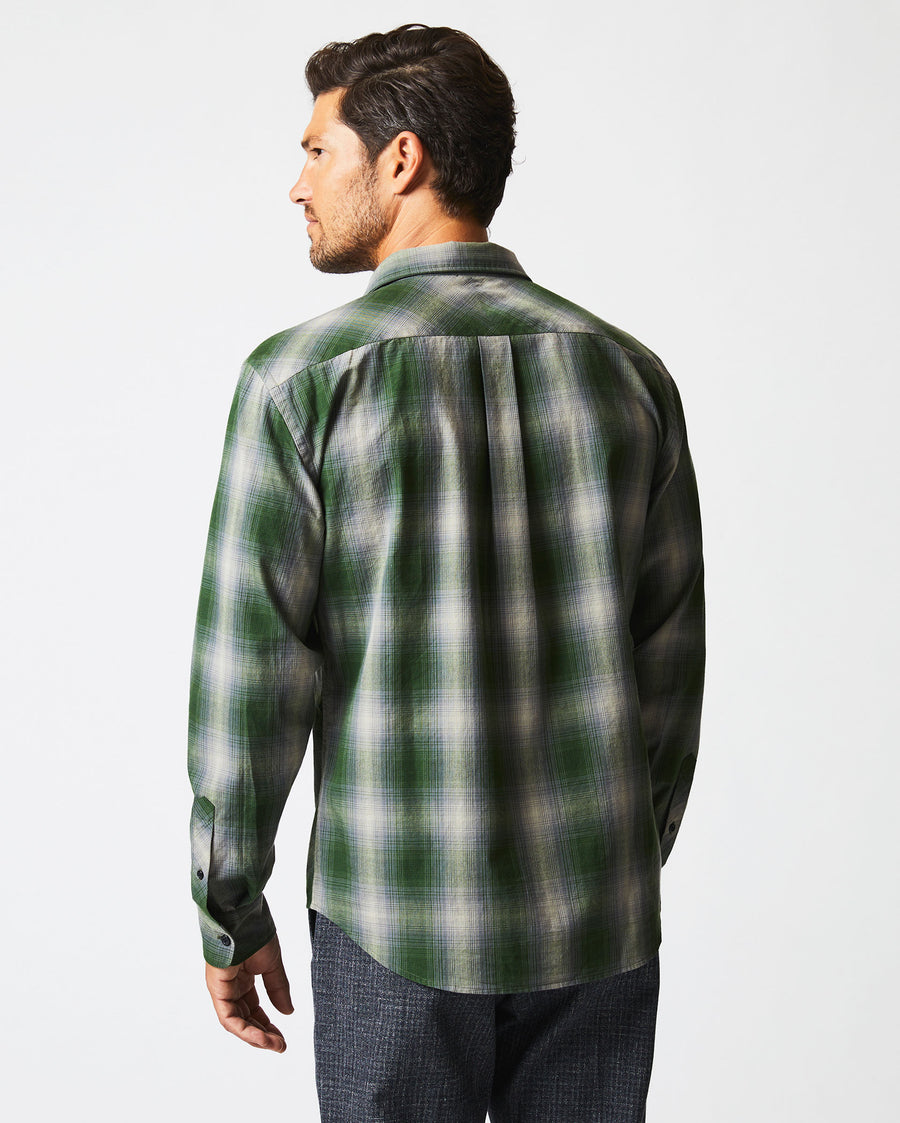 Male model wears the Shadow Plaid Tuscumbia Shirt in Green/Grey