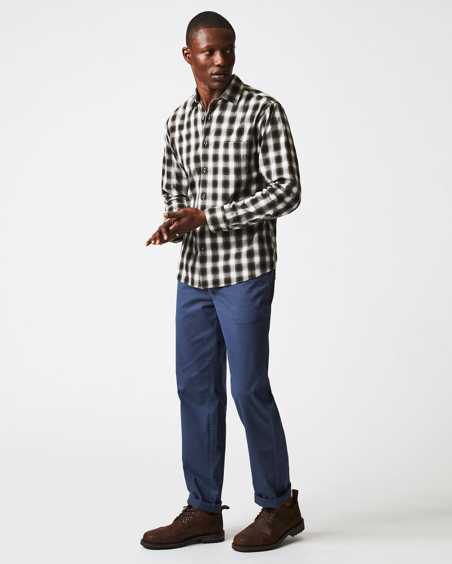 Male model wears the Shadow Plaid Tuscumbia in Black/Multi