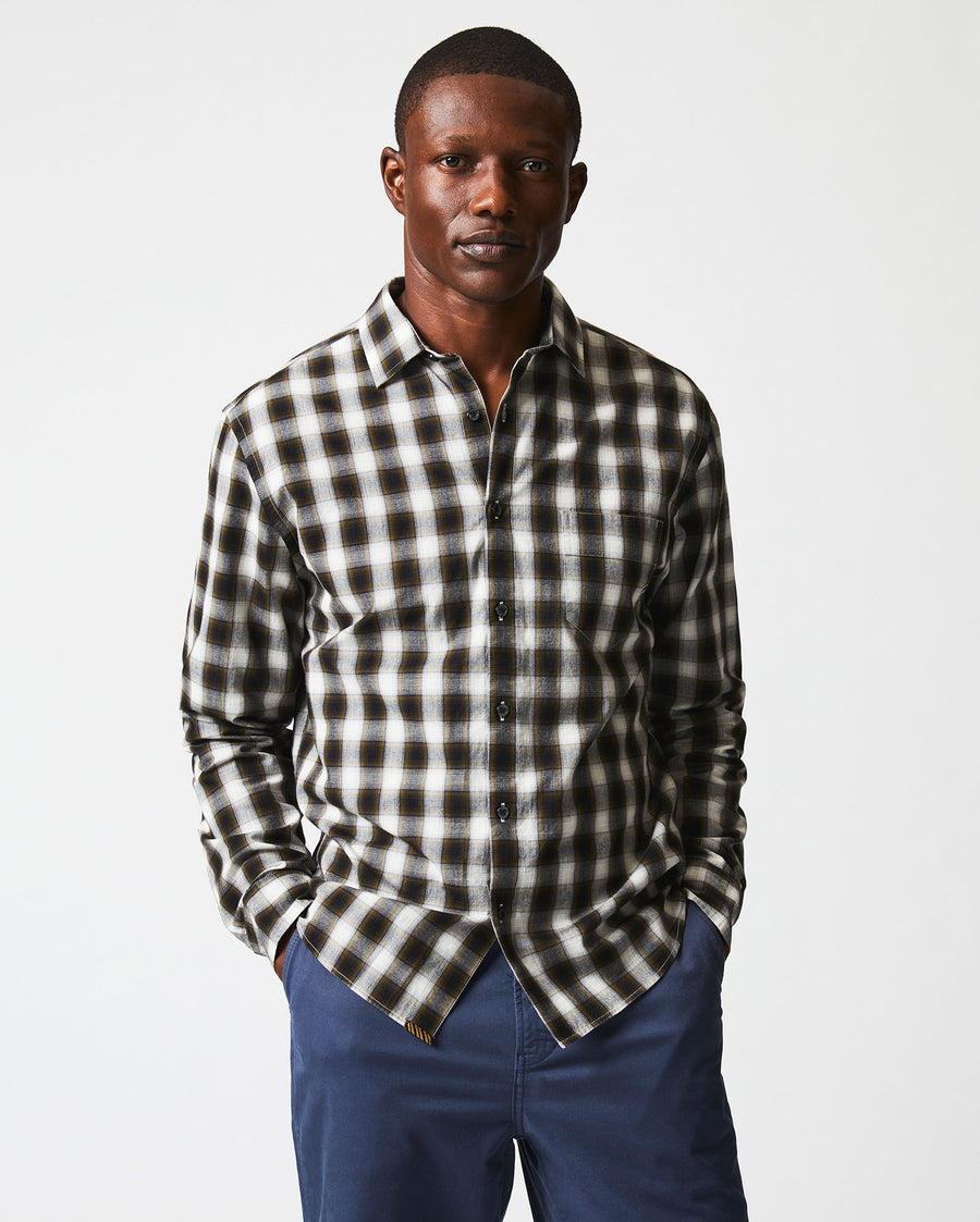 Male model wears the Shadow Plaid Tuscumbia in Black/Multi