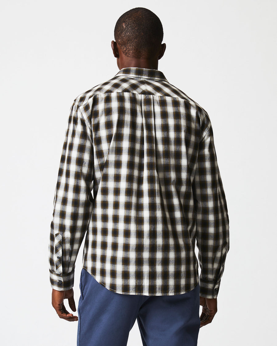 Male model wears the Shadow Plaid Tuscumbia in Black/Multi