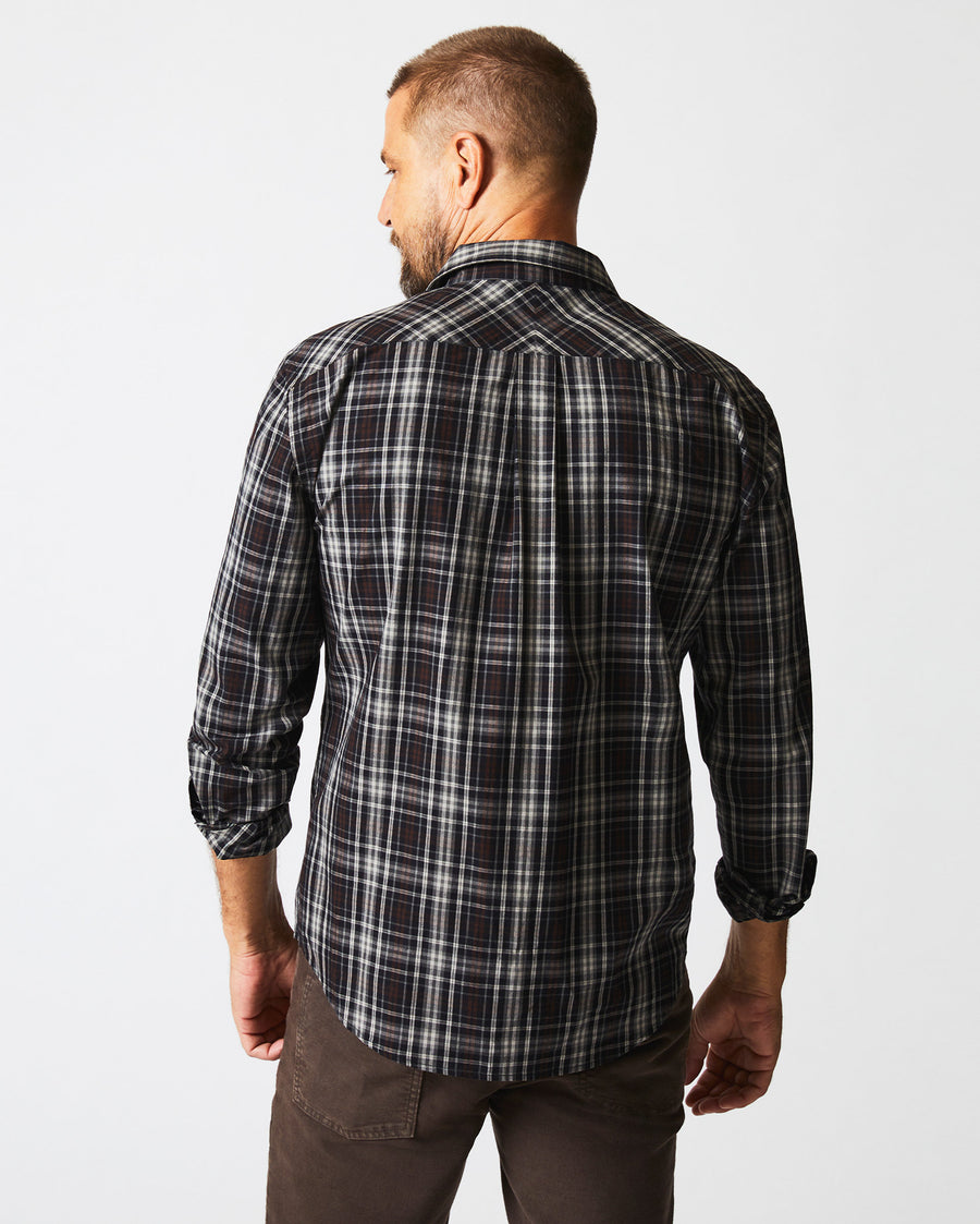 Male model wears the Tonal Plaid Tuscumbia Shirt in Black/Multi